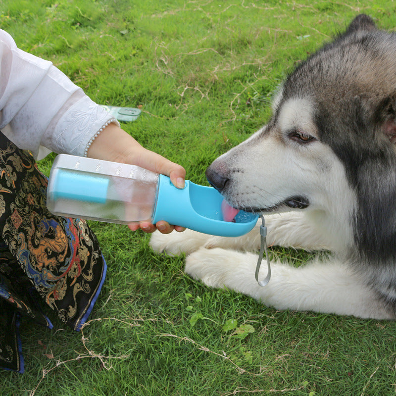 Multi-Functional Portable Pet Water Bottle – 600ml with Food Container & Waste Bag Dispenser